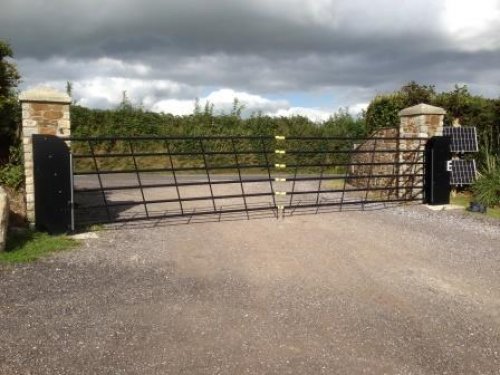 Vertical Lifting Gates for Sloping Driveways